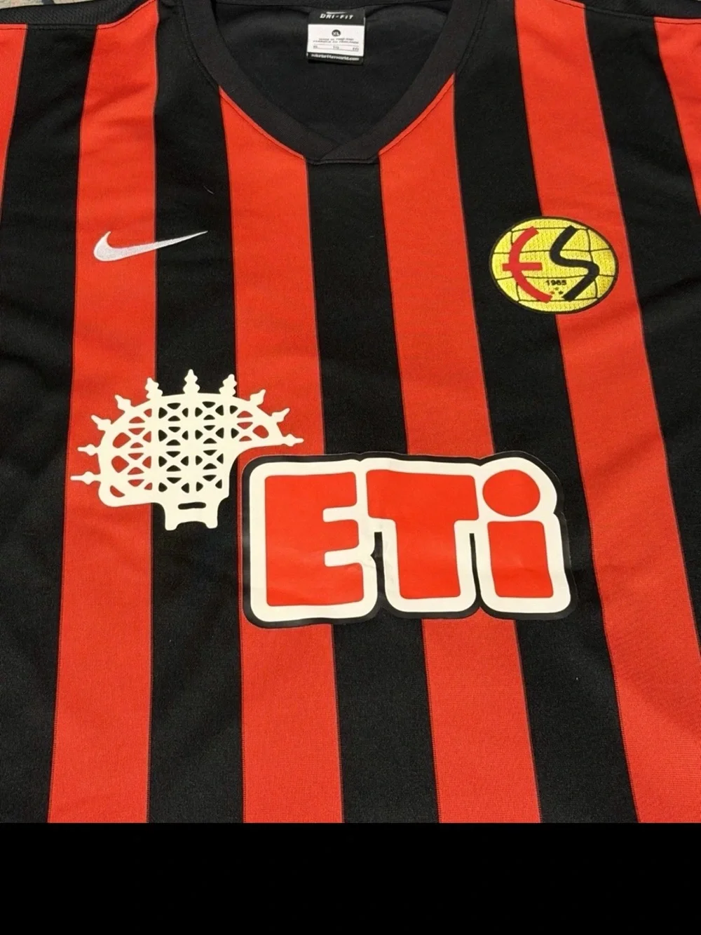 Nike Red and Black Striped Soccer Jersey with ETI Logo